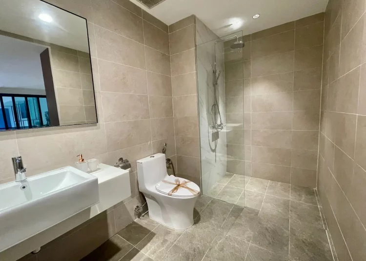 toilet with separate shower area