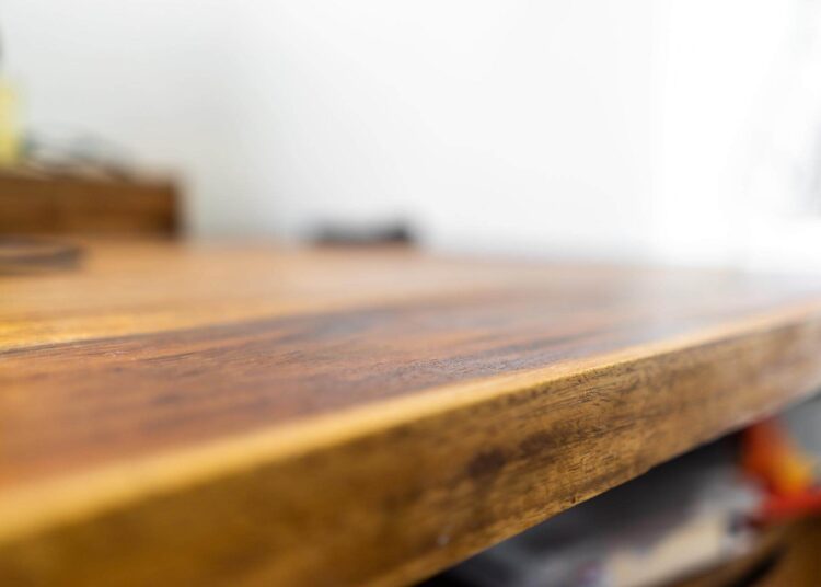 walnut wood grain filler on a walnut desk